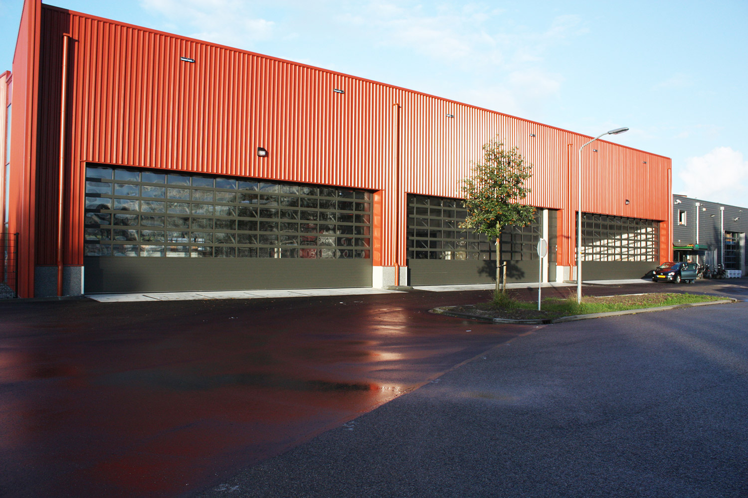 Arrow Sectional Overhead Doors in Modern Warehouse Facility